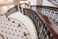 Winding staircase with forged rail