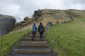 Stairs leading up to the top of Skogafoss waterfall in Iceland