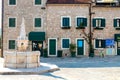 Winding street of the authentic, old town of Herceg Novi, Montenegro. We see old houses and very narrow