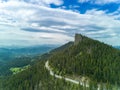 Winding track is like slopes of Rhodope Mountains with forests