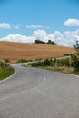 Winding Tuscany road landscape Royalty Free Stock Photo