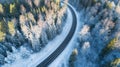 Winding winter road as seen from above. Winter season. Transportation concept
