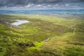 Winding wooden path of Cuilcagh Park boardwalk in the valley Royalty Free Stock Photo