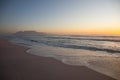 Serene sea moment at sunset with Table Mountain in background Royalty Free Stock Photo