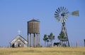 Windmill and abandoned prairie church, WY