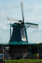 Windmill on agriculture farmland landscape in Petten (The Netherlands)