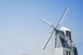 Windmill blue sky background Royalty Free Stock Photo