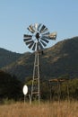 Windmill, blue sky and winter field landscape in the Free State Royalty Free Stock Photo