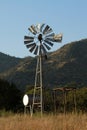 Windmill, blue sky and winter landscape in the Dome Area, Nortwest.