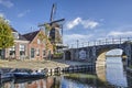Windmill, bridge and view to the polder