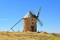 Windmill built in stone and wood in Belmonte. Sunny day blue sky.