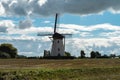 Windmill Buiten verwachting at Nieuw en sint Joosland. Royalty Free Stock Photo