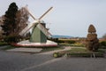 A windmill and a bush sculpture / topiary at the Skagit Valley, La Conner, USA Royalty Free Stock Photo