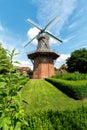 Windmill in the city park of Papenburg in summer, East Frisia