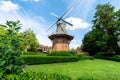 Windmill in the city park of Papenburg in summer, East Frisia