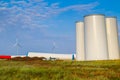 Windmill construction. Installation of wind turbine. Blue sky Royalty Free Stock Photo