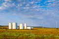 Windmill construction. Installation of wind turbine. Blue sky Royalty Free Stock Photo