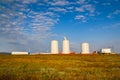 Windmill construction. Installation of wind turbine. Blue sky Royalty Free Stock Photo