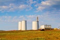 Windmill construction. Installation of wind turbine. Blue sky Royalty Free Stock Photo