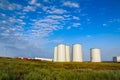 Windmill construction. Installation of wind turbine. Blue sky Royalty Free Stock Photo