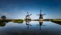 windmill in the country reflected in the water Royalty Free Stock Photo