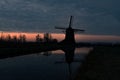 Windmill at dawn, De Rietveldse Molen, Hazerswoude Dorp Royalty Free Stock Photo