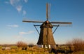 Windmill De Oude Doorn in a Dutch village