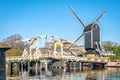 Traditional windmill and drawbridge in dutch city of Leiden