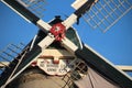 Windmill de Roode Leeuw along the Turfsingel in Gouda with sails on it in the Netherlands. Royalty Free Stock Photo