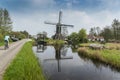 Windmill in a Dutch landscape Royalty Free Stock Photo