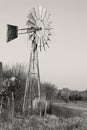 Black and white photo of a Windmill, winter field landscape photo in the Dome area near Parys. Free State Royalty Free Stock Photo