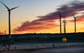 Windmill farm during sunrise. Clean Energy Transition Concept Royalty Free Stock Photo