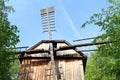 Windmill in forest in open-air museum
