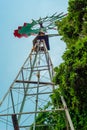 Windmill, with green blades, used for water extraction, taken from Tecoh Royalty Free Stock Photo