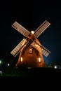 Windmill illuminated at Night. Royalty Free Stock Photo