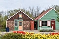 Windmill Gardens with springtime tulips Dutch Village Replica Buildings Royalty Free Stock Photo