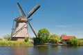 Windmill at Kinderdijk in a sunny spring day Royalty Free Stock Photo