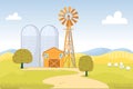 Windmill for Making Flour near Wheat Storage. Royalty Free Stock Photo