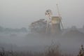 Windmill with mist over it in How Hill, Norfolk Royalty Free Stock Photo