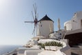 Windmill of Oia town at sunny day, Santorini Royalty Free Stock Photo