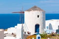 Windmill in Oia village, Santorini island, Greece Royalty Free Stock Photo