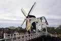 Windmill and old bridge Royalty Free Stock Photo