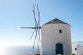 Windmill over the beautiful sea of Santorini Royalty Free Stock Photo