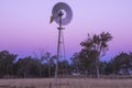 Windmill in a paddock Royalty Free Stock Photo
