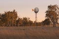 Windmill in a paddock Royalty Free Stock Photo