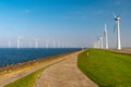 Windmill park westermeerdijk Netherlands, wind mill turbine with blue sky in ocean, green energy Royalty Free Stock Photo