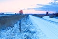 Windmill and path for bikes in winter Holland Royalty Free Stock Photo