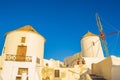 Windmill of picturesque Oia town Santorini island and Caldera Royalty Free Stock Photo