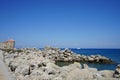 Windmill pier at the commercial harbor in Rhodes city. Rhodes, Greece