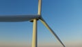 Windmill propeller rotating in closeup. Wind turbine producing renewable energy.